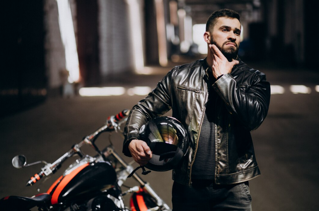 motorcycle rider wearing leather jacket