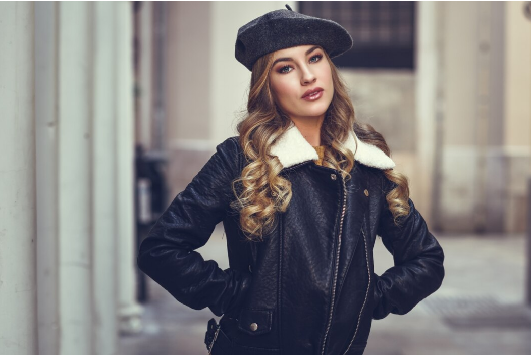 women wearing leather jackets and hats